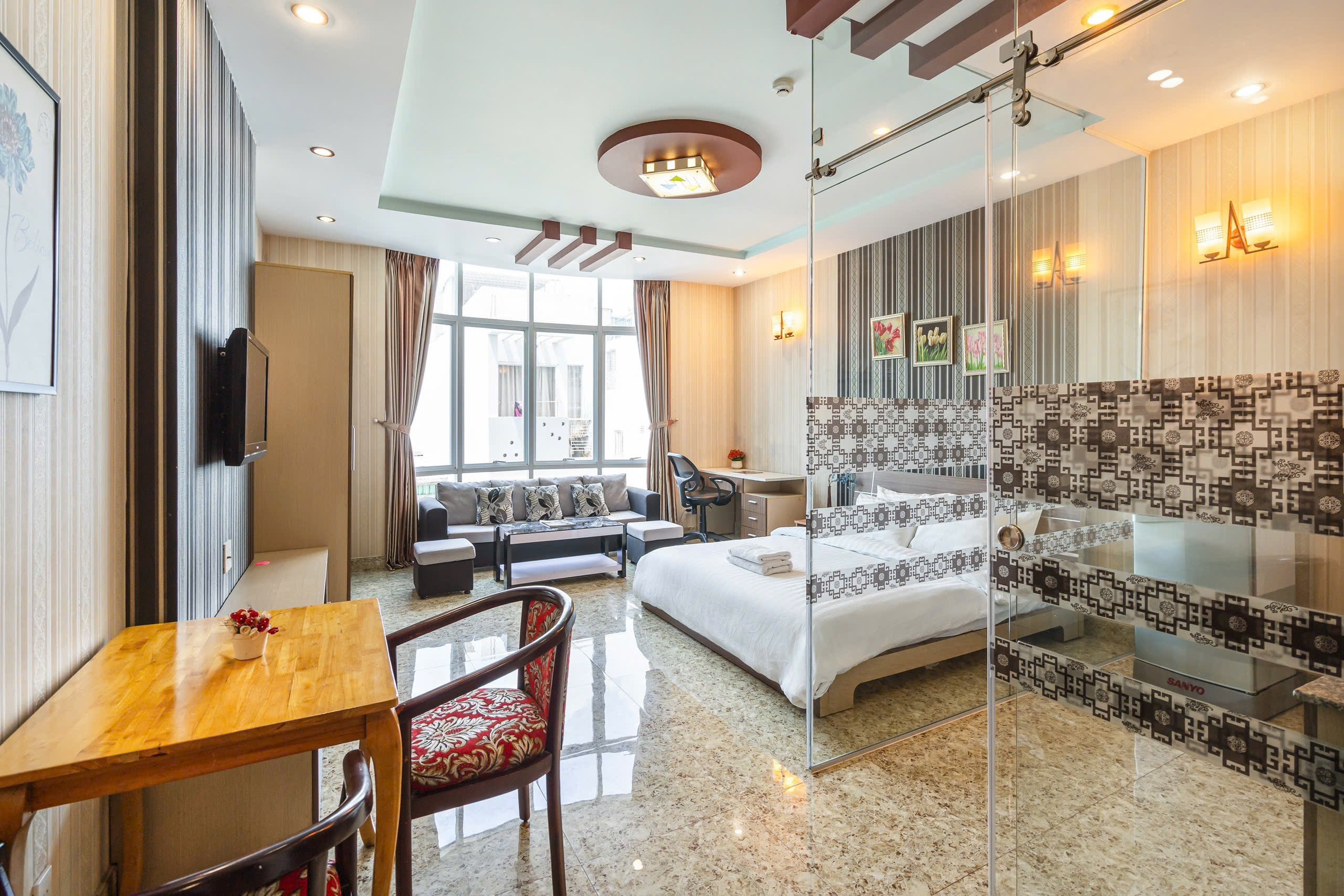 CĂN HỘ 1 PHÒNG NGỦ CÓ BỨC TƯỜNG KÍNH LỚN STYLE CHÂU ÂU Ở TRUNG TÂM QUẬN 1 ảnh 2